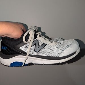 New Balance White and Black Sneakers with Blue Accents